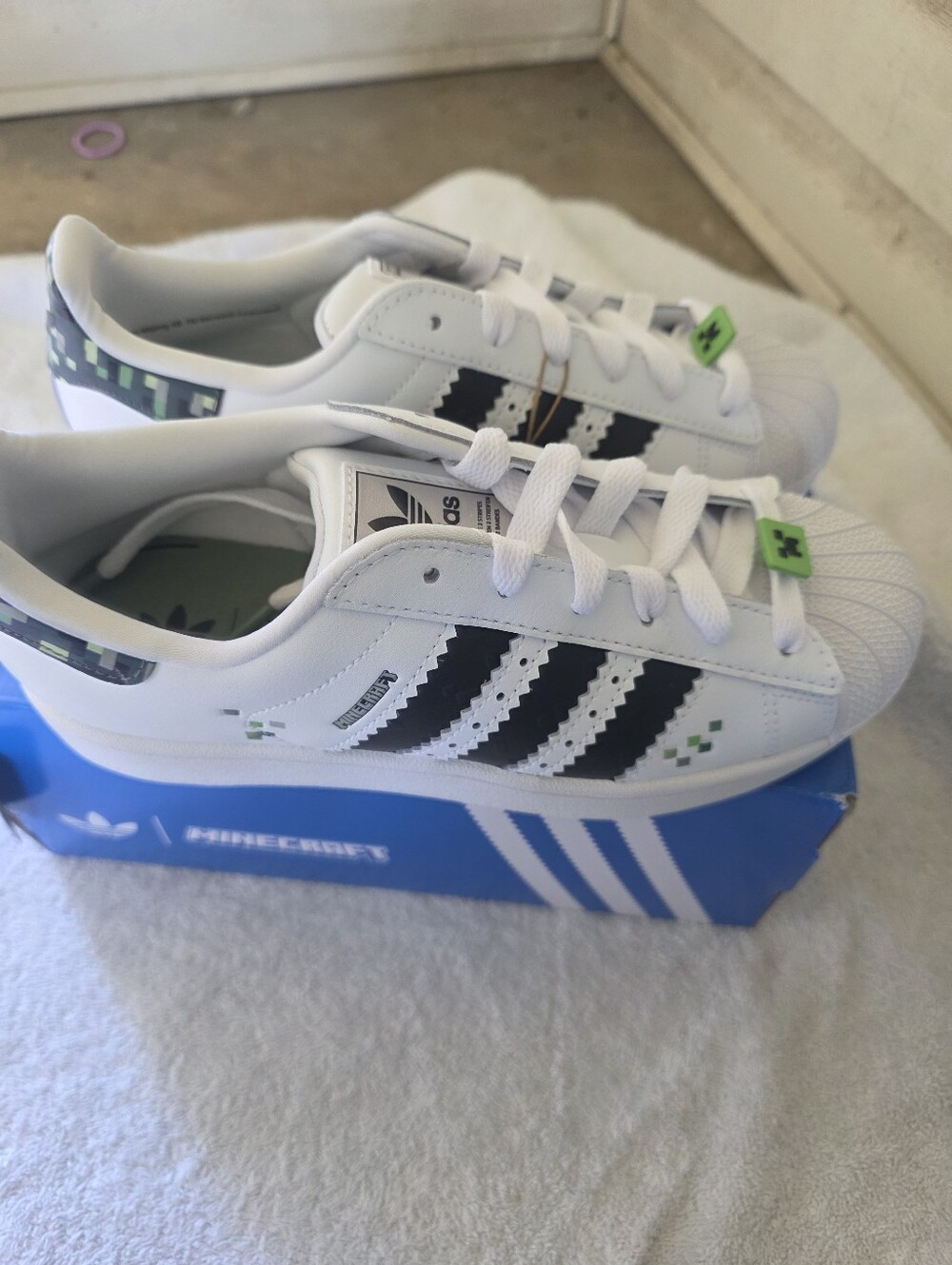 adidas White Sneakers with Black Stripes and Green Pixel Accents 6Y